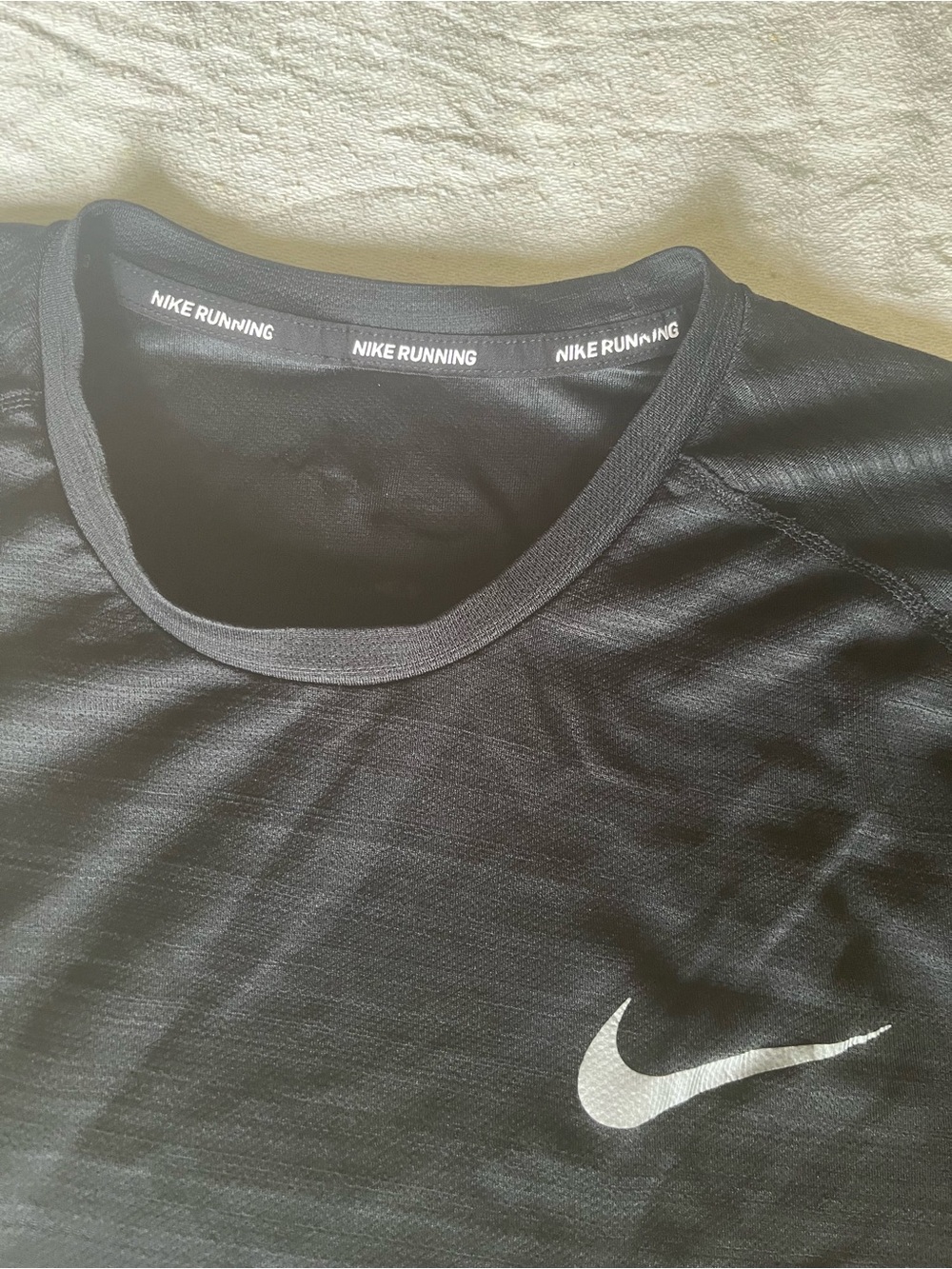 Nike Black Short-Sleeve Running Tee with Silver Swoosh